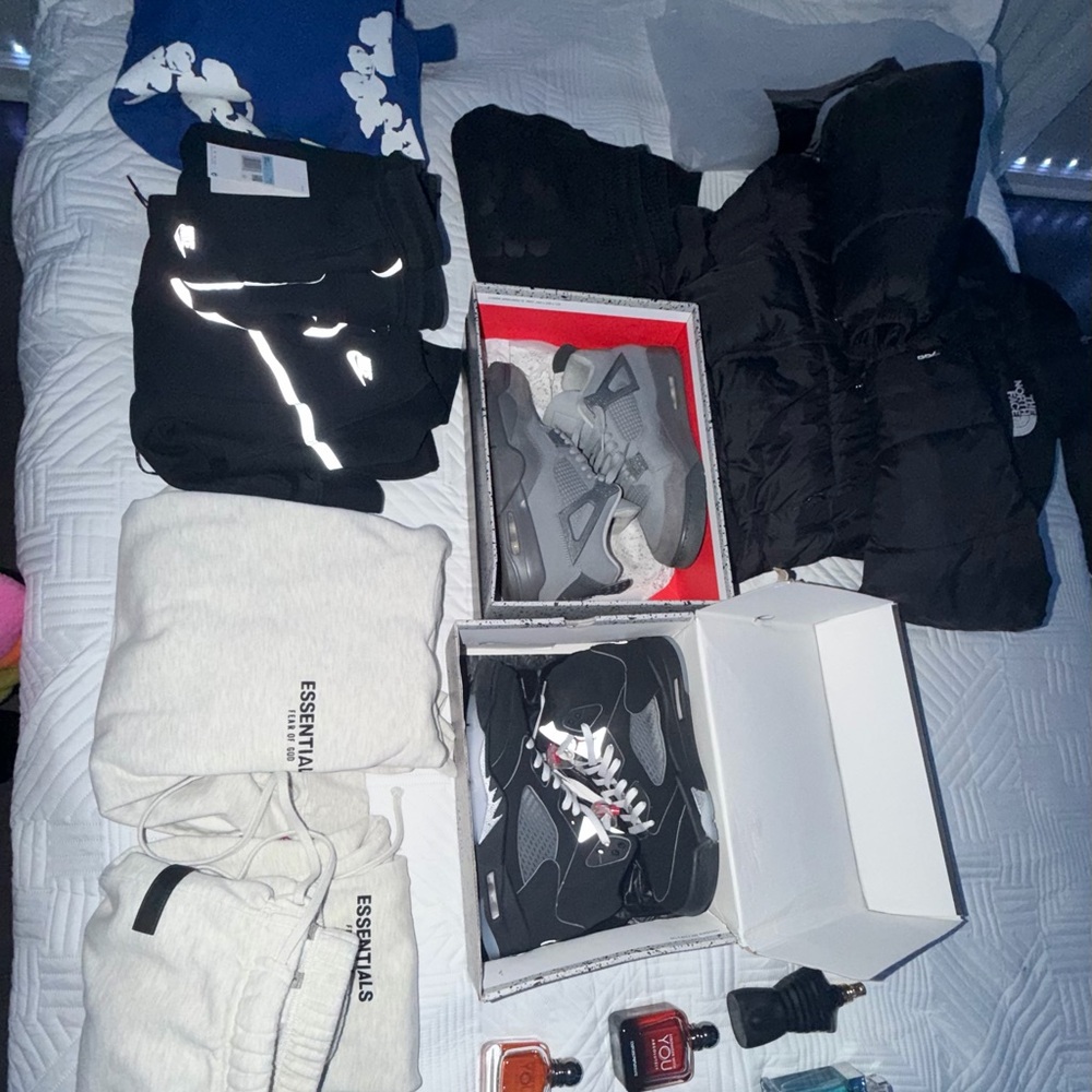 A bunch of designer clothes